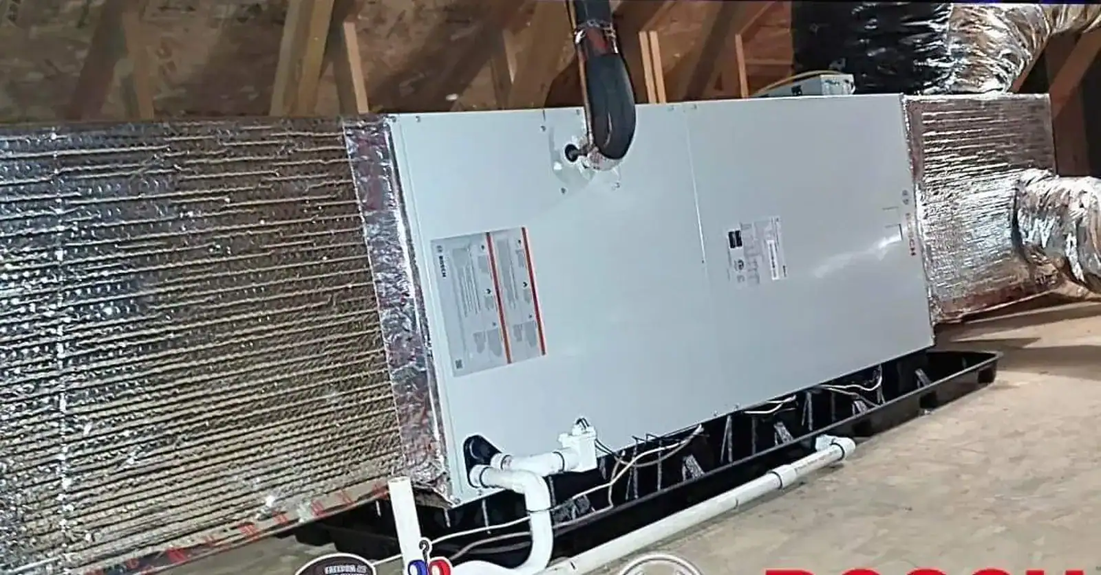 Attic air handler installation with condensate trap