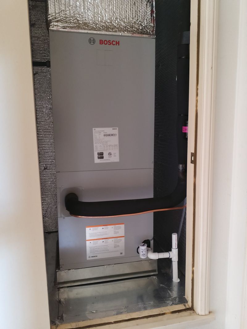 Freedom AC Bosch air handler installation in attic showing professional ductwork